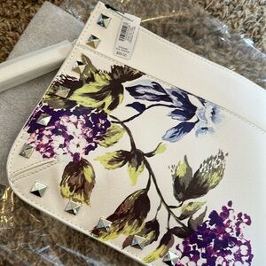 WHBM White Hydrangea print clutch with zipper and front pocket. NWT